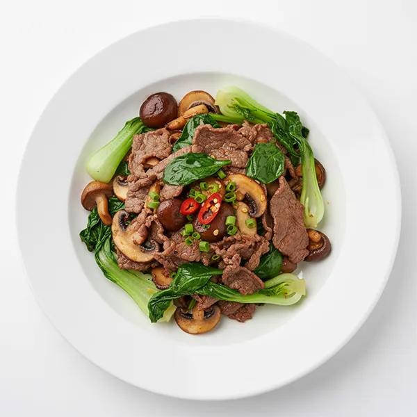 Sizzling Beef And Mushroom Medley With Vibrant Greens